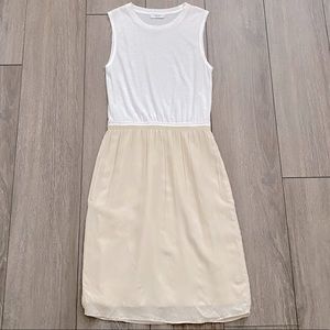 Babaton sleeveless dress with side pockets sz S